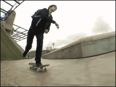 skateboard falls half pipe gif