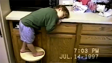 funny gif kid sleeping on kitchen sink