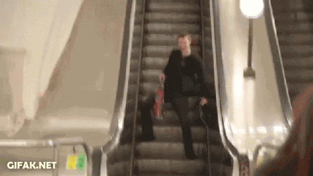 funny-gifs-falling-down-escalator